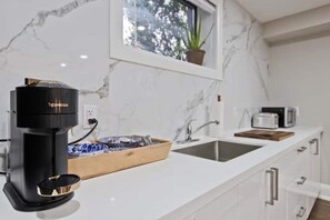 Fridge, microwave, coffee/tea maker, electric kettle