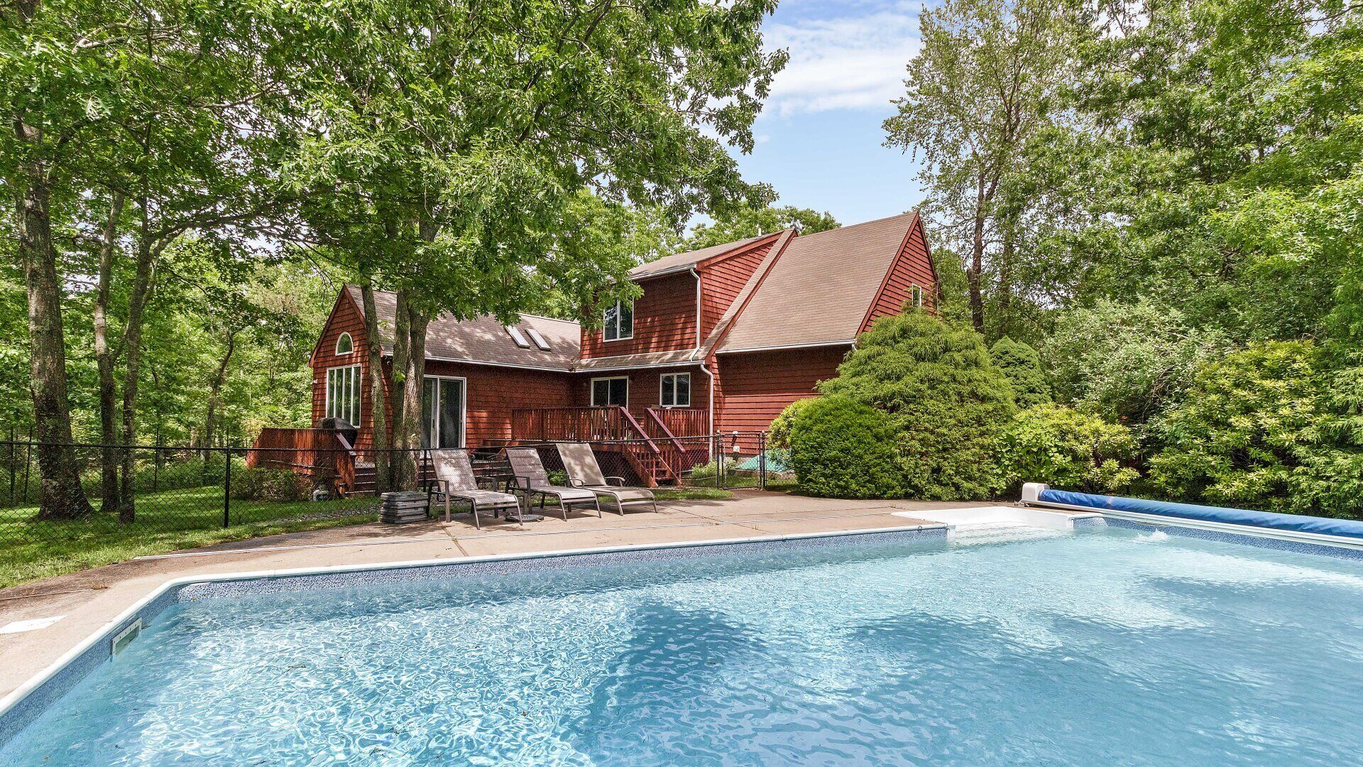 Contemporary Hampton Bays home on one acre of manicured lawn, private pool,...