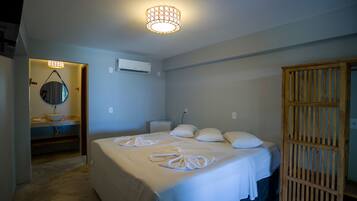 Quarto premium, 6 quartos, vista para o oceano, no piso térreo | Frigobar, roupa de cama