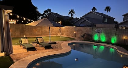 Great location with King Suite, Game Room, HEATED Pool, and Putting Green!