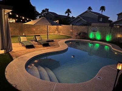 Great location with King Suite, Game Room, HEATED Pool, and Putting Green!