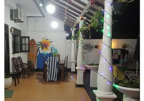 Outdoor dining - Ashen’s Beach House , Boossa , Sri Lanka . (Beachfront Villa with 4 A/C rooms) (Rathgama)