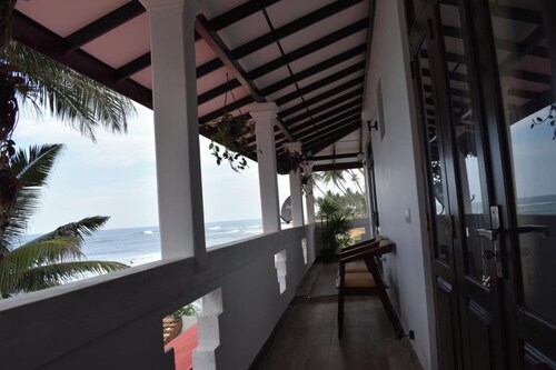 Ashen’s Beach House , Boossa , Sri Lanka . (Beachfront Villa with 4 A/C rooms)