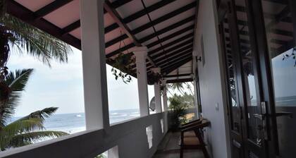 Ashen’s Beach House , Boossa , Sri Lanka . (Beachfront Villa with 4 A/C rooms)