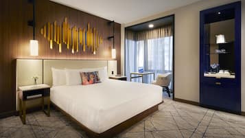 Habitación Deluxe, 1 cama de matrimonio grande | 1 dormitorio, ropa de cama de alta calidad, minibar y caja fuerte