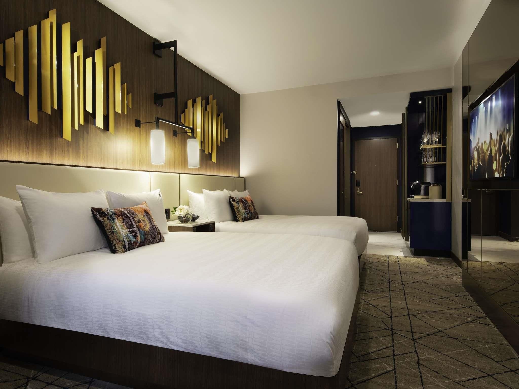 Habitación Deluxe, 2 camas Queen size | Ropa de cama de alta calidad y minibar 