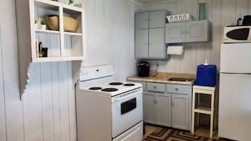 Fridge, stovetop, coffee/tea maker, electric kettle