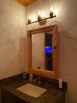 Combined shower/tub, hair dryer, towels, soap