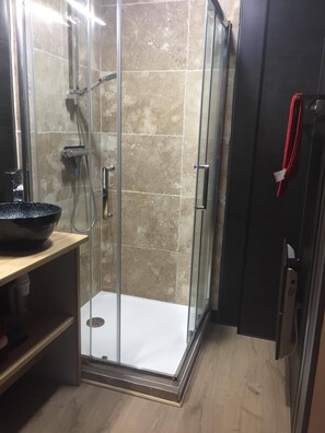 Shower, hair dryer, towels, soap
