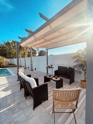 Terrace/patio - Ila's Beach House: Near IMG-Heated Salt Pool- Pets OK-Modern Organic Smart Home (Bradenton)