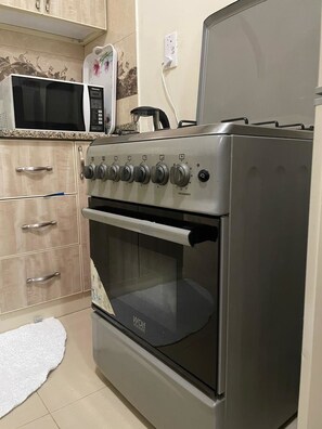 Fridge, microwave, stovetop, electric kettle