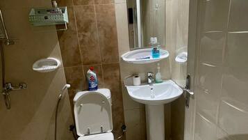 Shower, towels, soap, shampoo