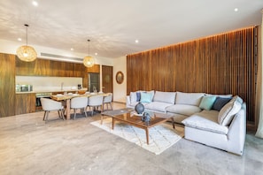 Signature-Apartment | Wohnbereich | LED-Fernseher