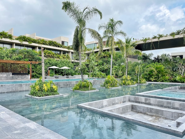 Outdoor pool, open 9:00 AM to 8:30 PM, pool umbrellas, sun loungers - Mistiq Luxury Condo (Tulum)