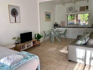 Family Apartment | Living area | 32-inch LCD TV with digital channels, TV, DVD player - Nature Retreat on Mandalay (Nelly Bay)