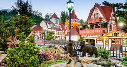 Downtown by Chattahoochee River, sit on front porch as horse and buggy stroll by