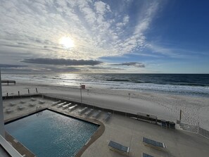 On the beach, sun-loungers, beach towels