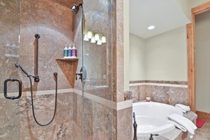Bathtub, jetted tub, hair dryer, towels