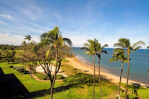 On the beach, sun loungers, beach towels