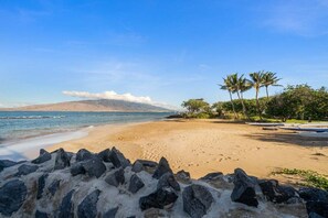 On the beach, sun loungers, beach towels