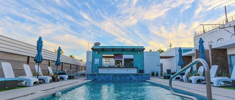 Outdoor pool, pool umbrellas, pool loungers