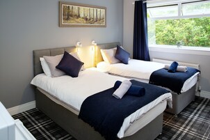 Twin Room | Blackout curtains, iron/ironing board, free WiFi, bed sheets