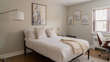 1 bedroom, desk, iron/ironing board, travel cot