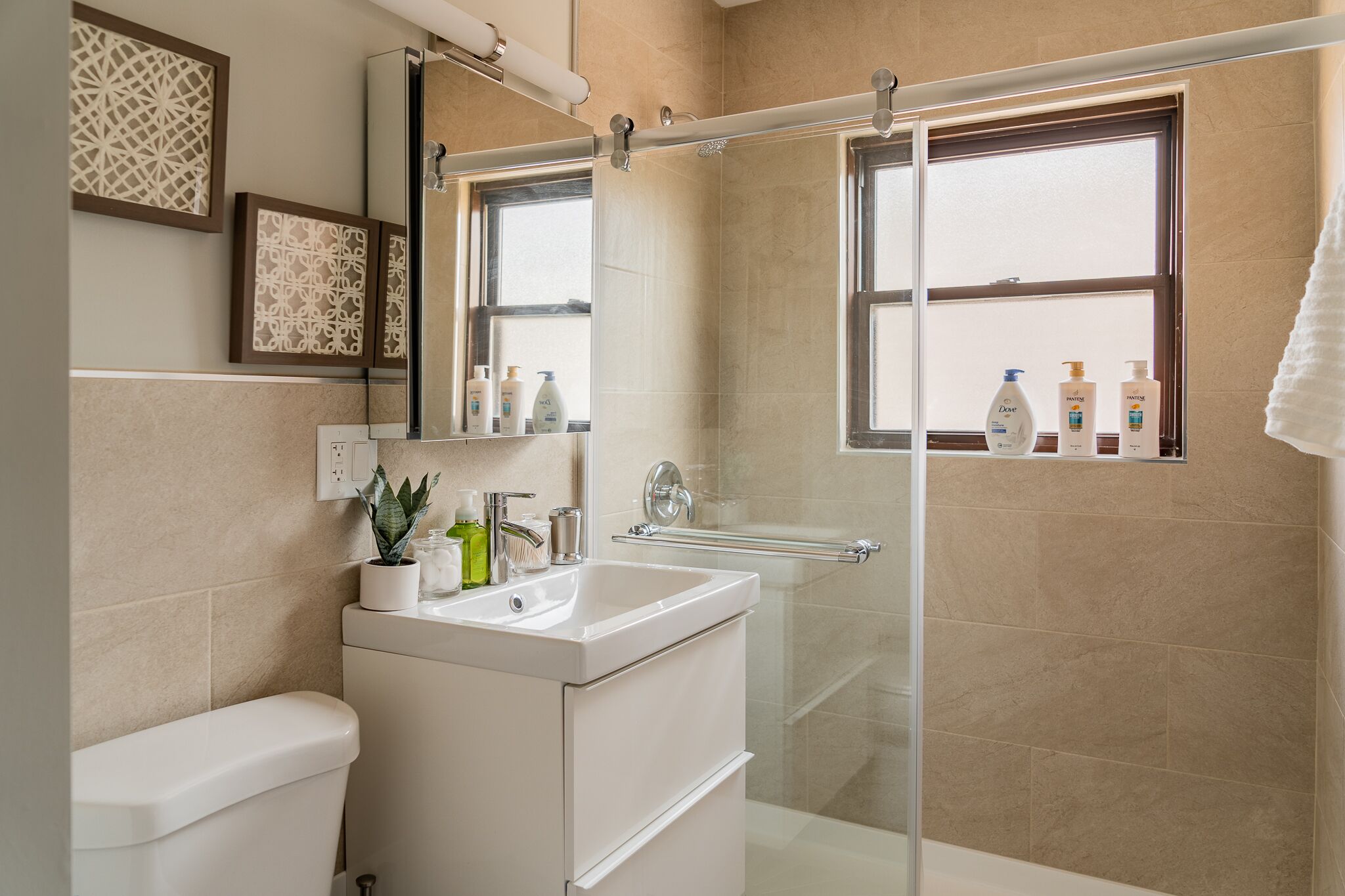 Shower, hair dryer, towels, soap