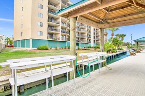 Outdoor dining - Wind Drift #313N - Delightful Condo Across from Gulf w/ Beach Access! (Orange Beach)