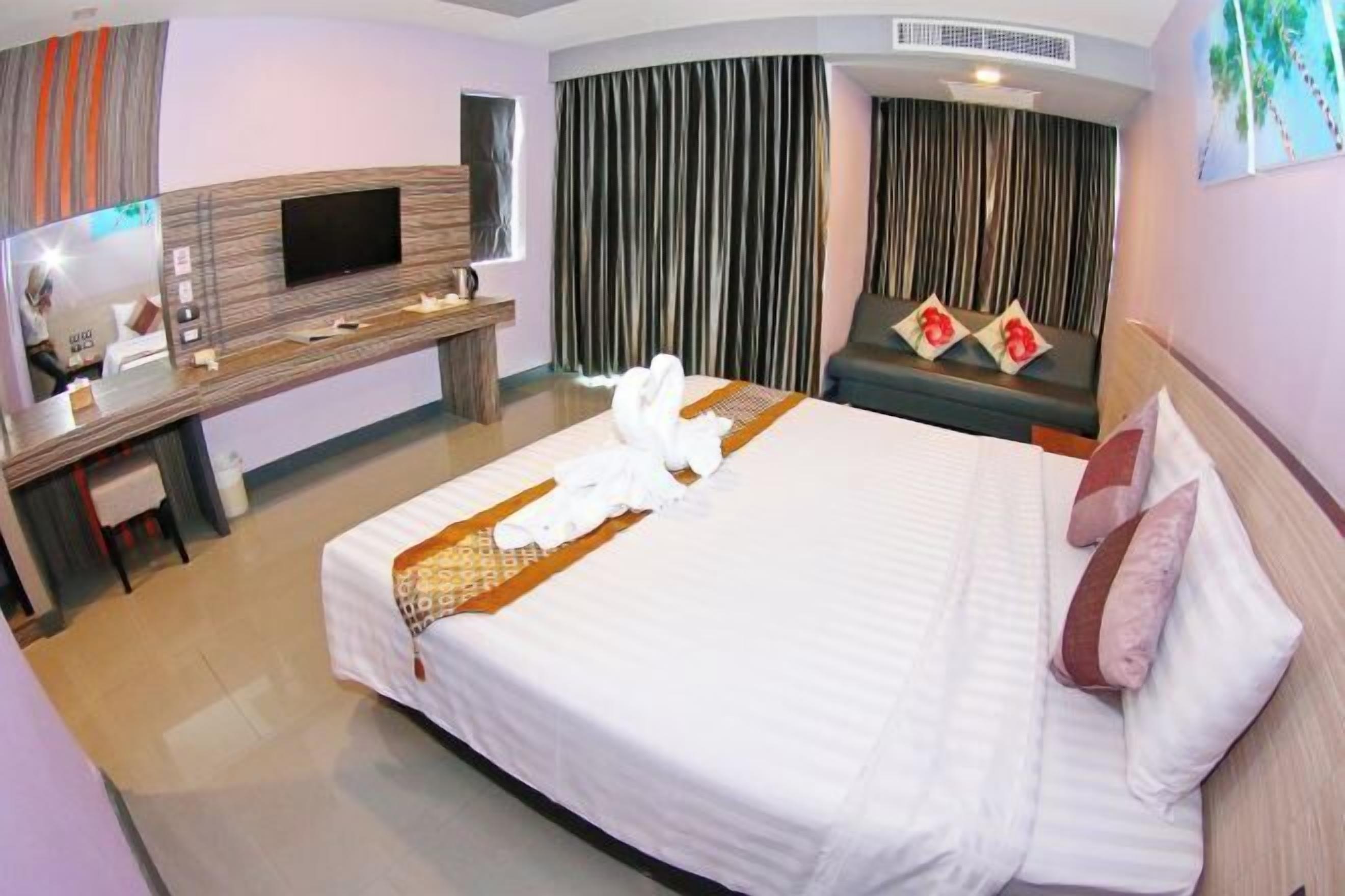 Hypoallergeen beddengoed, een minibar, een kluis op de kamer, een bureau