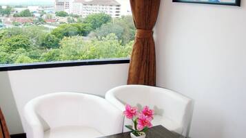 Deluxe Triple Room, Balcony, Garden View | Garden view