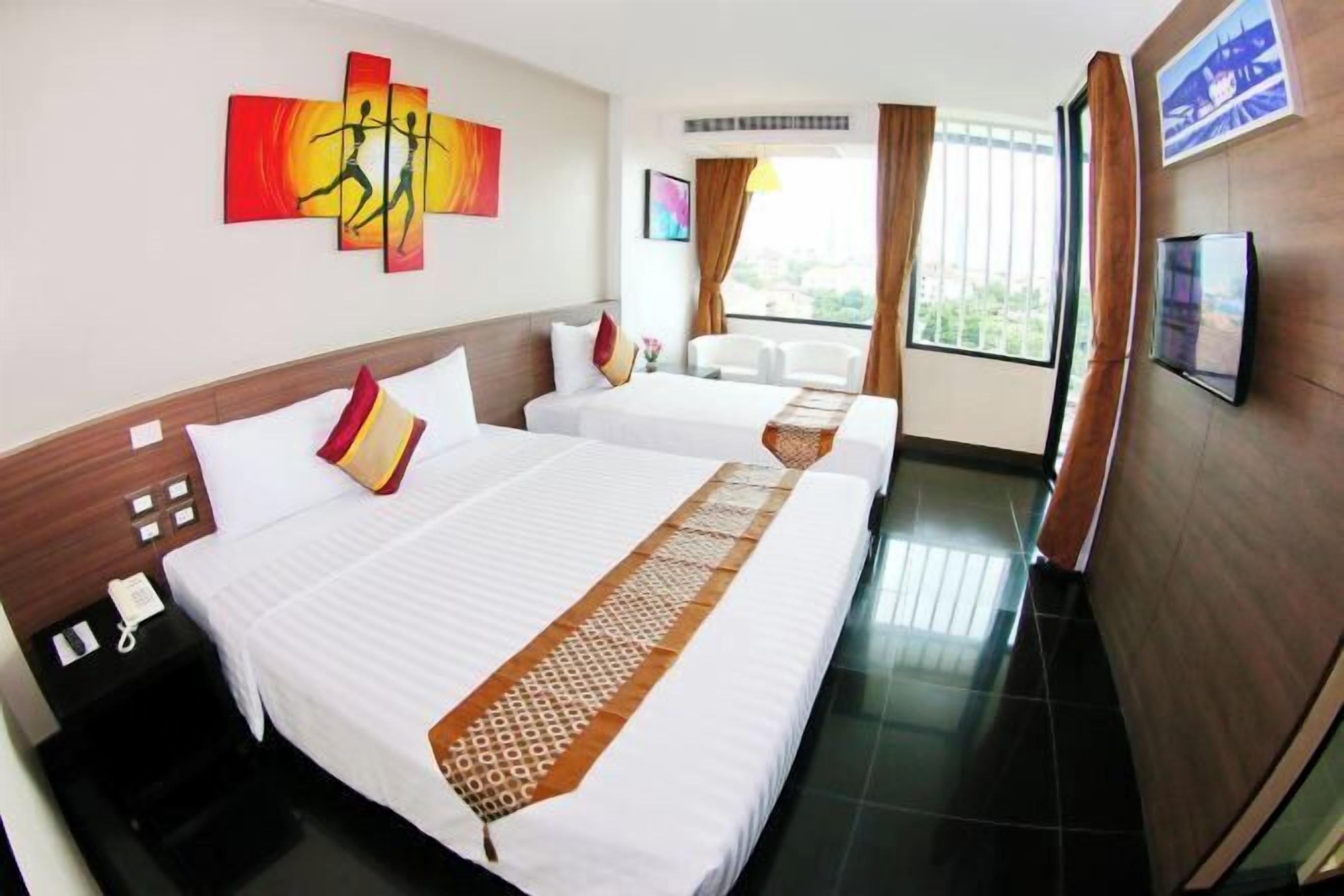 Hypoallergeen beddengoed, een minibar, een kluis op de kamer, een bureau