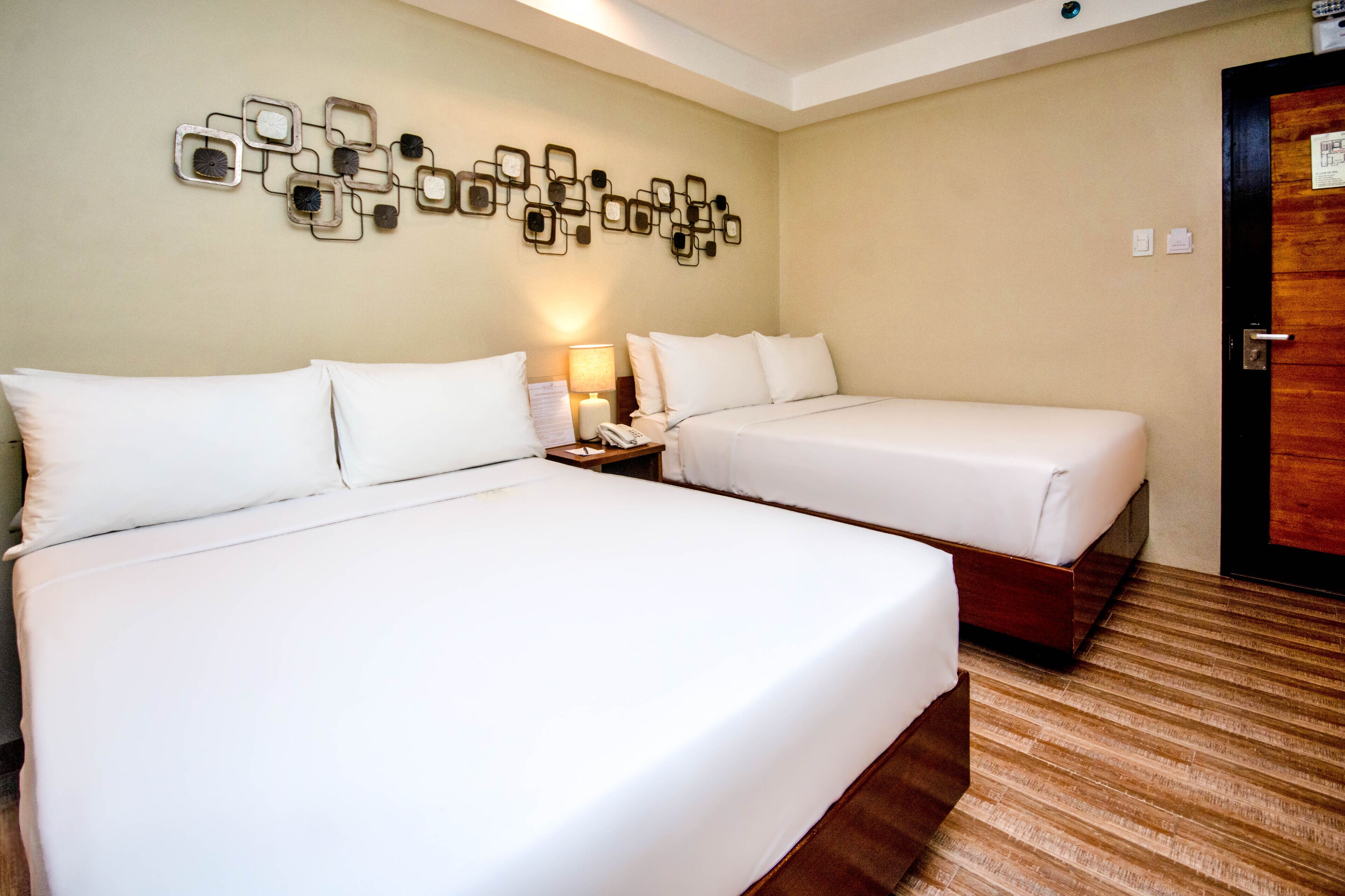 deluxe room with balcony | 1 bedroom, premium bedding, in-room safe, desk