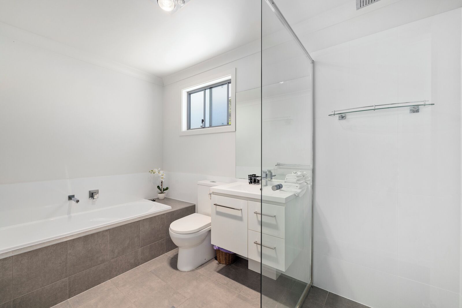 Bathtub, hair dryer, towels, soap