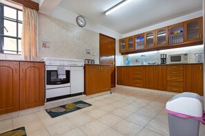 Apartment, 3 Bedrooms | Private kitchen | Full-size fridge, microwave, oven, electric kettle - Bamboo Suites by Edmor suites (Nairobi)