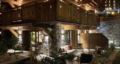 Luxurious Ski-in/Ski-out Apartment with 3 Bedrooms, Terrace & Spa Access in Les Allues