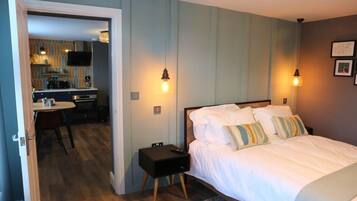 1 bedroom, desk, iron/ironing board, travel crib