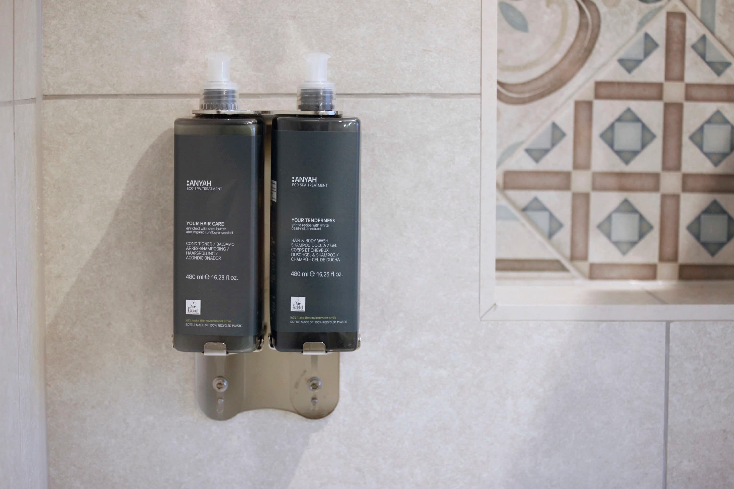 Shower, hair dryer, towels, shampoo