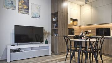 Comfort Apartment | Living room | 40-inch LCD TV with cable channels, TV