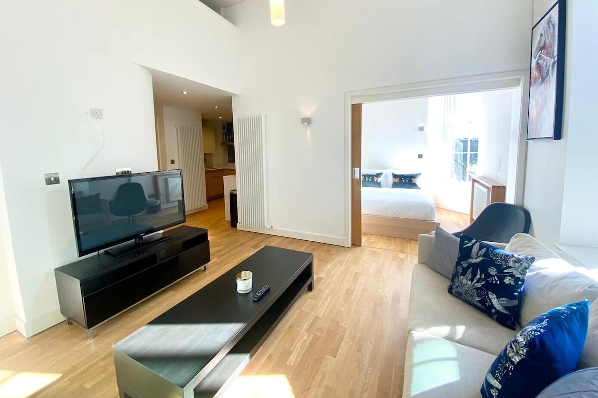 Deluxe appartement, 1 slaapkamer | Woonruimte