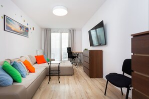 Deluxe Apartment | Living room | 40-inch LCD TV with cable channels, TV - P&O Apartments Kasprzaka III (Warsaw)