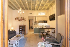 Exclusive Apartment | Living area | 40-inch flat-screen TV with cable channels, TV - Palacete 1620, Apartamentos Premium-Only adults (Granada)