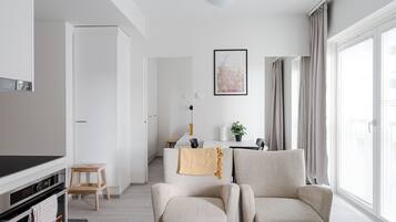 Standard Apartment, 1 Bedroom | Living area | 43-inch flat-screen TV with cable channels, TV, heated floors