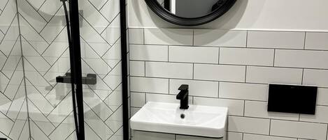 Shower, hair dryer, shampoo