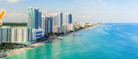 On the beach, sun loungers, beach towels