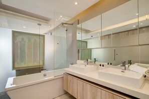 Bathtub, hair dryer, towels