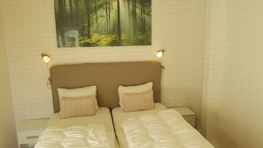 8 عدّة غرف نوم ومكتب وواي فاي وملاءات أسرّة