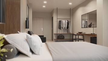 A modern bedroom with a large bed, a desk, and a wardrobe.