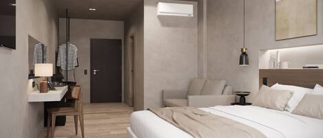 A modern hotel room with a bed, bedside table, lamp, and a desk with a chair.