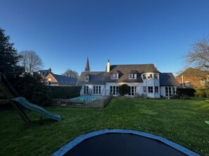 Outdoor pool, a heated pool - Large family home with pool in Normandy village center (Luneray)